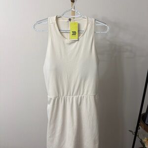 All in Motion Cream Sleeveless Dress with built in shorts and bra padding